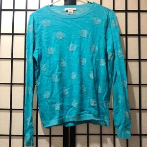 A polka dot blue long sleeve